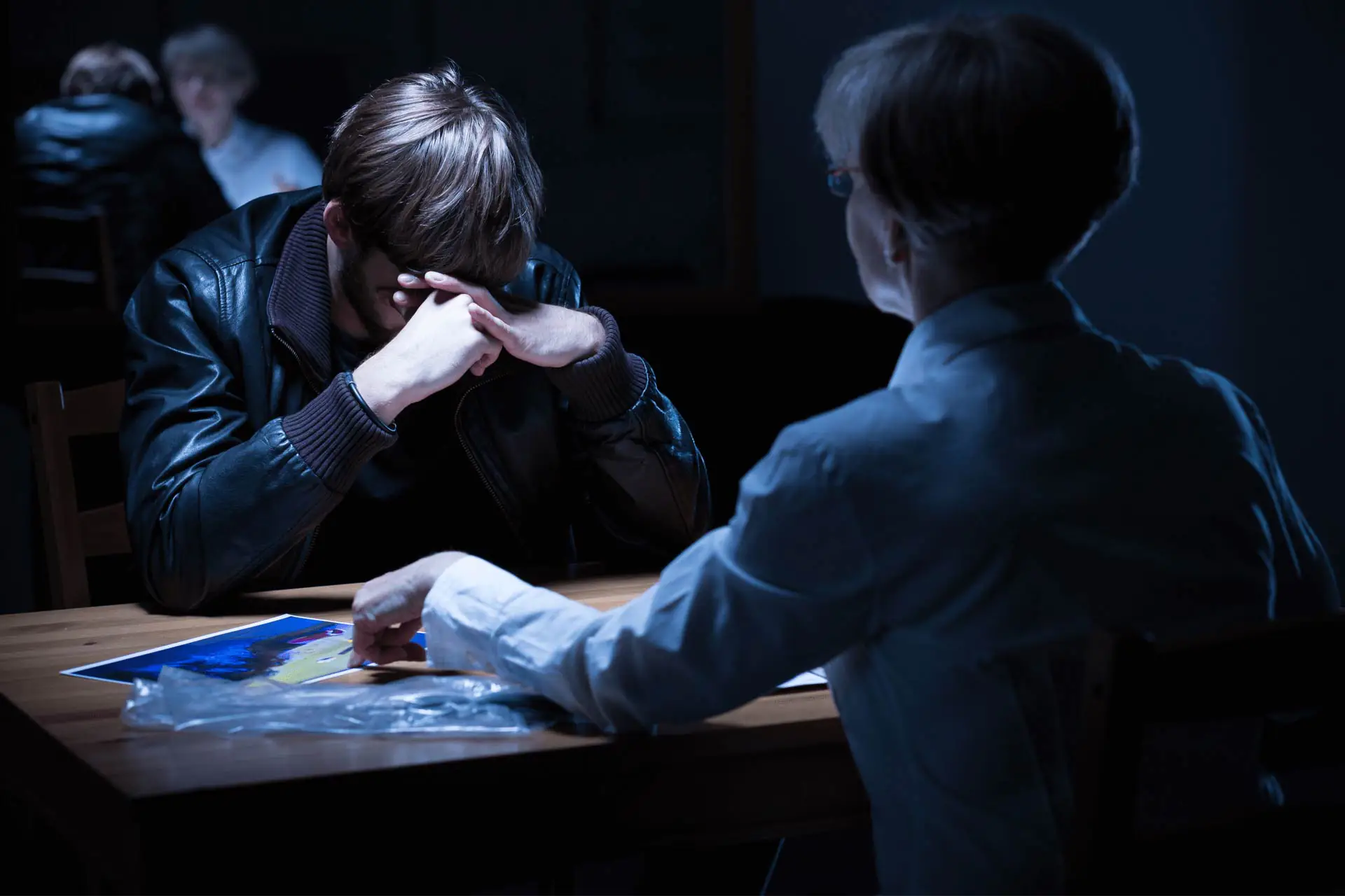 young-crying-criminal-police-interrogation-room.jpg